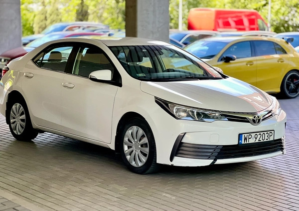 Toyota Corolla cena 33000 przebieg: 254000, rok produkcji 2016 z Warszawa małe 121